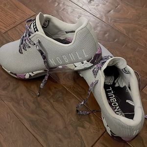 Gray with Purple floral bottoms. Worn 2 times. Did not work for me for nursing